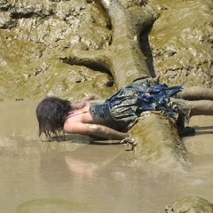 FOXY: Lydia fully immersed in mud