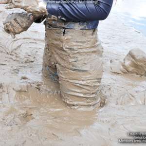 DungeonMasterOne: Mud!  Chastity goes mud-sliding in P.V.C. jeans!