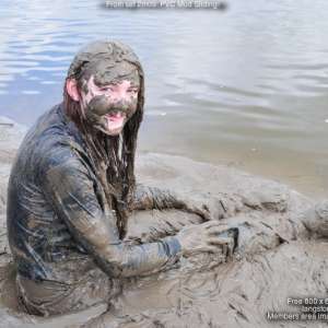 DungeonMasterOne: Mud!  Chastity goes mud-sliding in P.V.C. jeans!