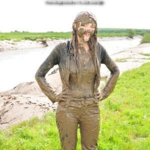 DungeonMasterOne: Mud!  Chastity goes mud-sliding in P.V.C. jeans!