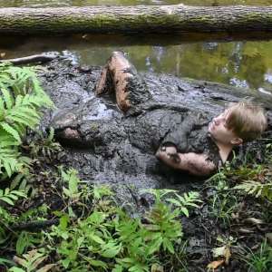 Stella: Stella finds 3 increasingly muddy spots in the woods.