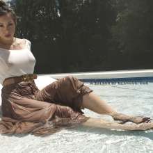 EdwinR: Lucy Purr wetlook in the pool