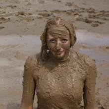 eileenvogel: Eileen in a white dress and heels in the mud