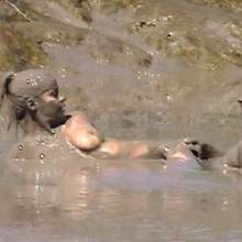 FOXY: A couple play in mud