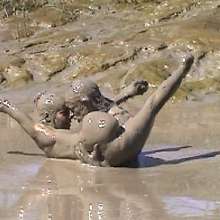 FOXY: A couple play in mud
