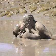 FOXY: A couple play in mud