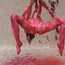 FOXY: Lola suspended and paint covered