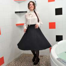 ufa217: Greta takes a bath in office clothes.