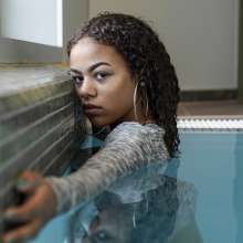 Jens German: Black girl in pool