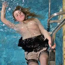 ufa217: Melissa looks totally awesome in her new wet business suit!