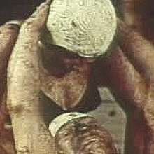mudwallower: Women wrestling in black mud
