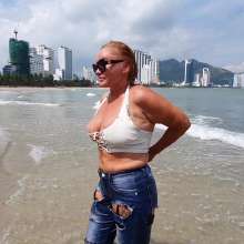 Wet_look_elena: Ripped Jeans  Stockings Heels and Small White Top in the Sea