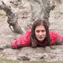 FOXY: Down jacket in deep mud