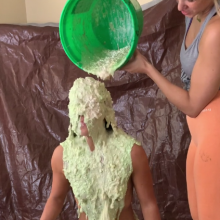 Slimed Models: New Model April Gets a Bucket of Our Nasty Fish Slime... Butt Naked!
