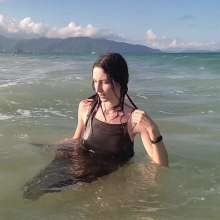 WetPlace: Wonder Kris Playing In The Waves In Black Dress