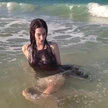 WetPlace: Wonder Kris Playing In The Waves In Black Dress
