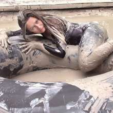 FOXY: video black unitard in mud