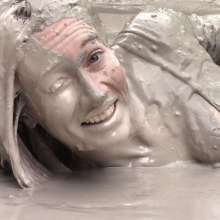 FOXY: video black unitard in mud