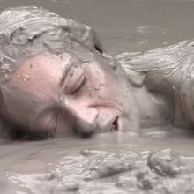 FOXY: video black unitard in mud