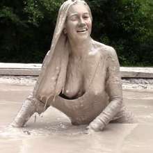 FOXY: video black unitard in mud