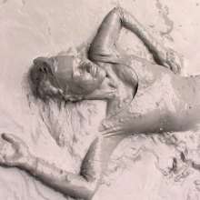 FOXY: video black unitard in mud