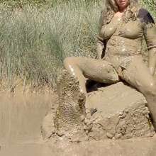 FOXY: In deep mud with red boots.