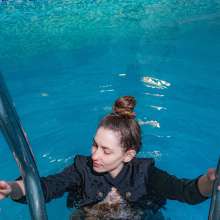 Wet Live Team: Natashka Swam in a Dress and Jacket in the Pool