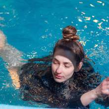 Wet Live Team: Natashka Swam in a Dress and Jacket in the Pool