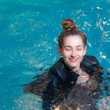 Wet Live Team: Natashka Swam in a Dress and Jacket in the Pool