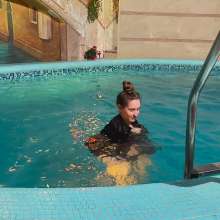 Wet Live Team: Natashka Swam in a Dress and Jacket in the Pool