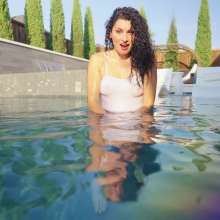 WetlookFashion: Bella's Fully-Clothed Swim into Temptation