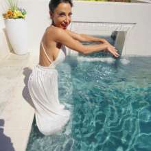 WetlookFashion: Charlie Gets Wet in White Satin