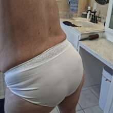 Chuck M: Chuck wear white lace panties in the tub