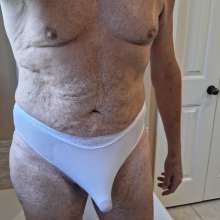 Chuck M: Chuck wear white lace panties in the tub