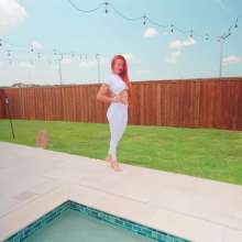 WetlookFashion: Krispeachi Gets Wet in a Sexy White Jumpsuit