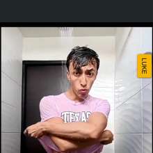 WETColours: Luke in the Shower in a Pink T-shirt and Jeans