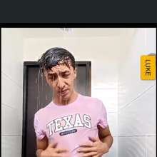 WETColours: Luke in the Shower in a Pink T-shirt and Jeans