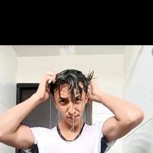 WETColours: Luke in the Shower Wearing a White T-shirt and Black Shorts