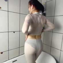 WetPlace: Marina Shower In Bathtub In White Clothes