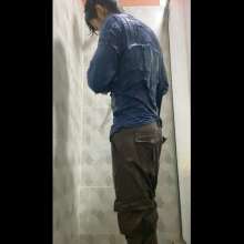 WETColours: Mike in the Shower in a Blue Shirt and Brown Pants