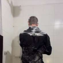 WETColours: Ostin Showers Wearing a Black Shirt and Using Shampoo