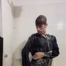 WETColours: Ostin Showers Wearing a Black Shirt and Using Shampoo