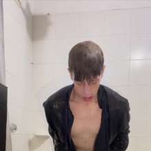 WETColours: Ostin Showers Wearing a Black Shirt and Using Shampoo