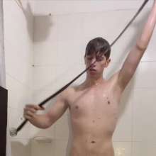 WETColours: Ostin Showers Wearing a Black Shirt and Using Shampoo