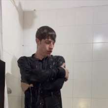 WETColours: Ostin Showers Wearing a Black Shirt and Using Shampoo