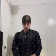 WETColours: Ostin Showers Wearing a Black Shirt and Using Shampoo