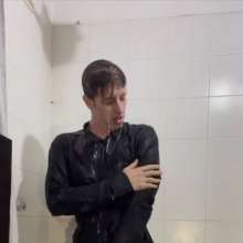 WETColours: Ostin Showers Wearing a Black Shirt and Using Shampoo