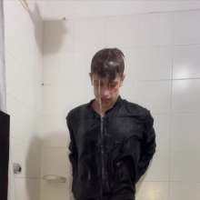 WETColours: Ostin Showers Wearing a Black Shirt and Using Shampoo