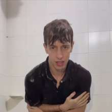 WETColours: Shower in Red Polo Shirt and Black Pants with Mega Shampoo