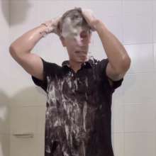 WETColours: Shower in Red Polo Shirt and Black Pants with Mega Shampoo